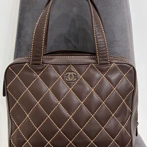 Chanel Surpique Zip Around Quilted Leather Satchel